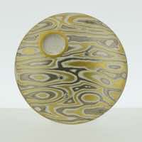 Transit patterned 22k gold, 18k white gold and silver mokume gane discus brooch (31mmø) with 22k gold rimmed cutaway and diamond details.